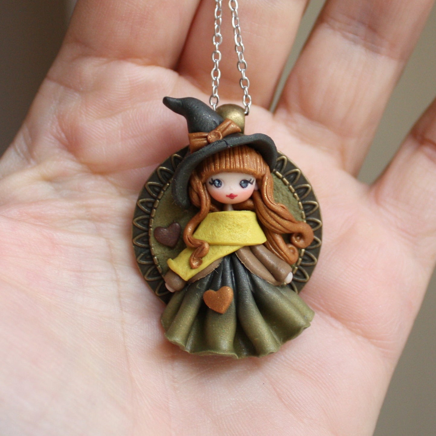 Collana in acciaio inox con piccola streghetta in fimo VI