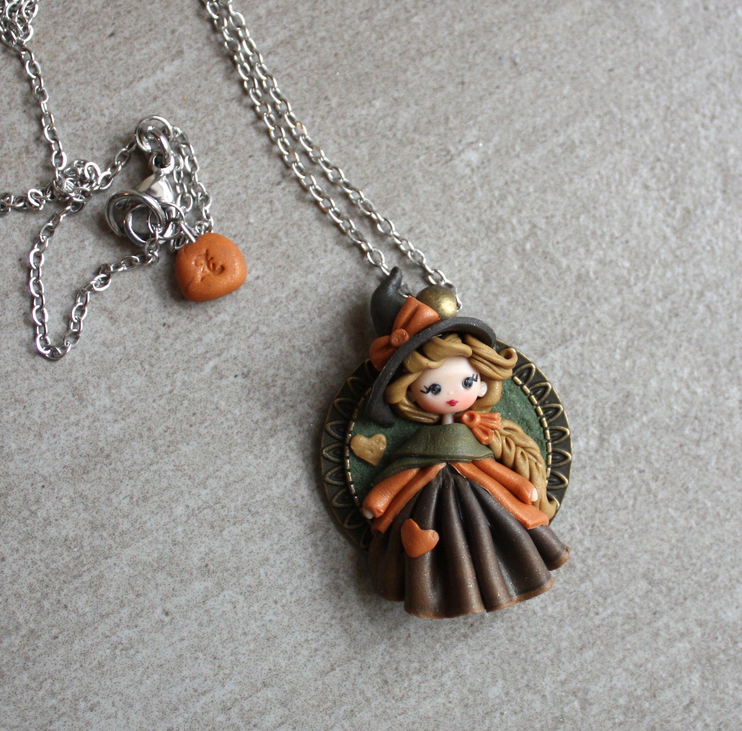 Collana in acciaio inox con piccola streghetta in fimo VII