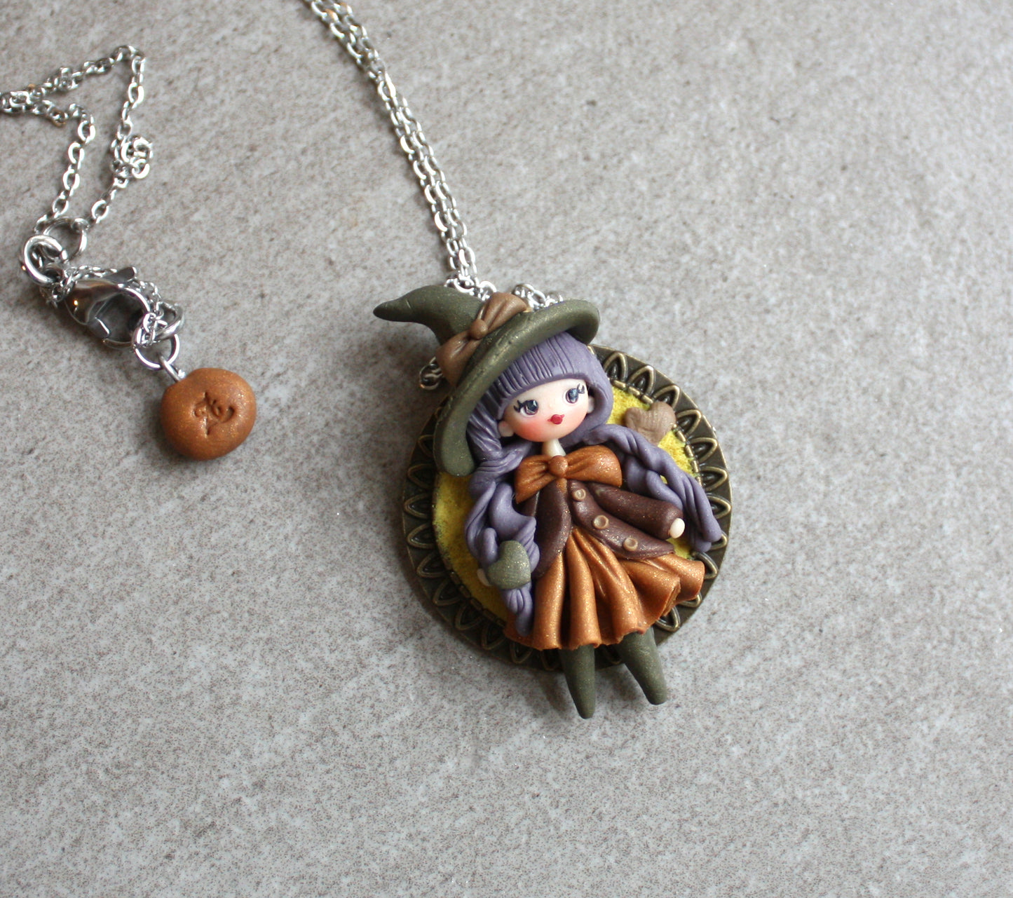 Collana in acciaio inox con piccola streghetta in fimo IX